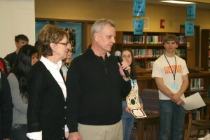 Jennifer and J.P. Howard, owners of the Tremont, recognize MHS students with perfect third quarter attendance Wednesday afternoon in the MHS Library.