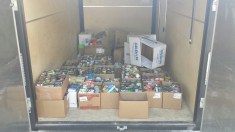 Nearly 1,000 food items were donated at the Blue/White Classic Friday, Aug. 23.
