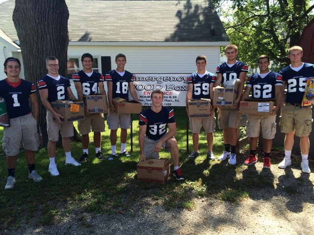 Members of the Marshalltown High School Football Team dropped off 344 non-perishable food items at the Emergency Food Box last week, all proceeds from the annual Blue & White Classic football scrimmage.